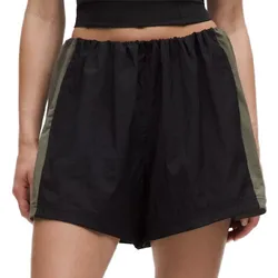 Black and olive colorblock athletic shorts with an elastic waistband.