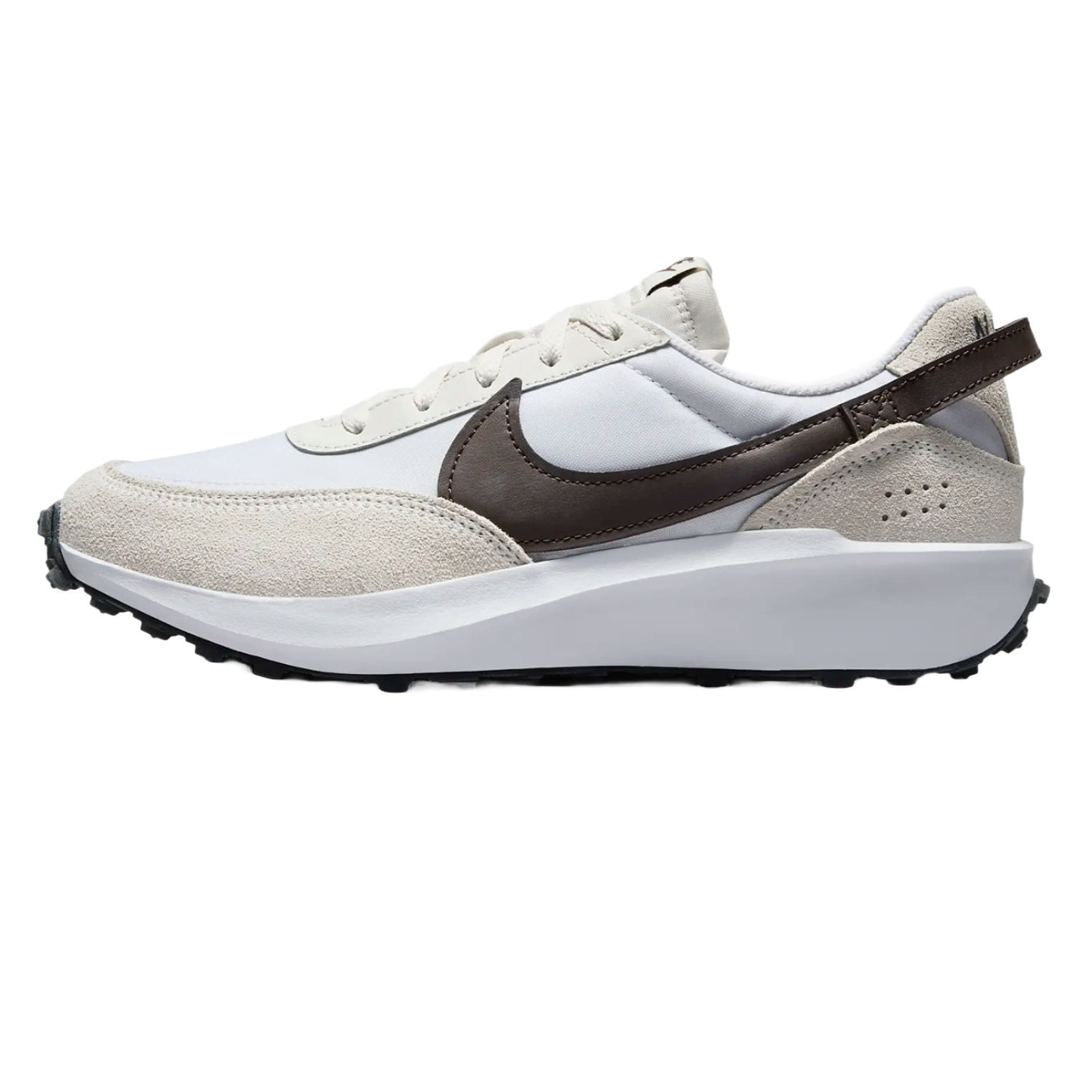 A white and beige sneaker with a dark brown Nike swoosh, featuring a suede overlay and textured sole.