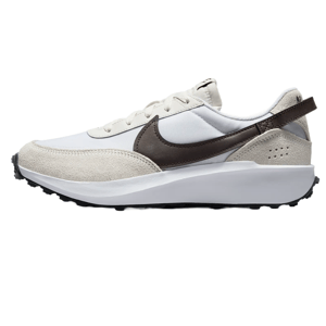 A white and beige sneaker with a dark brown Nike swoosh, featuring a suede overlay and textured sole.