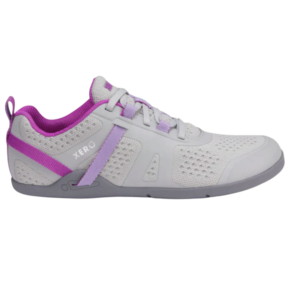 A minimalist athletic shoe with a gray mesh upper, featuring purple and lavender accents, designed by Xero.