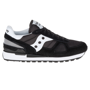 Black and white Saucony Shadow 5000 sneaker with mesh and suede elements, featuring the signature Saucony wave logo on the side.