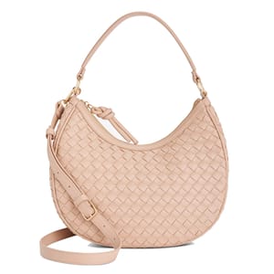 A beige woven hobo bag with a curved silhouette, featuring both a shoulder strap and an adjustable, detachable crossbody strap, and gold-tone hardware.