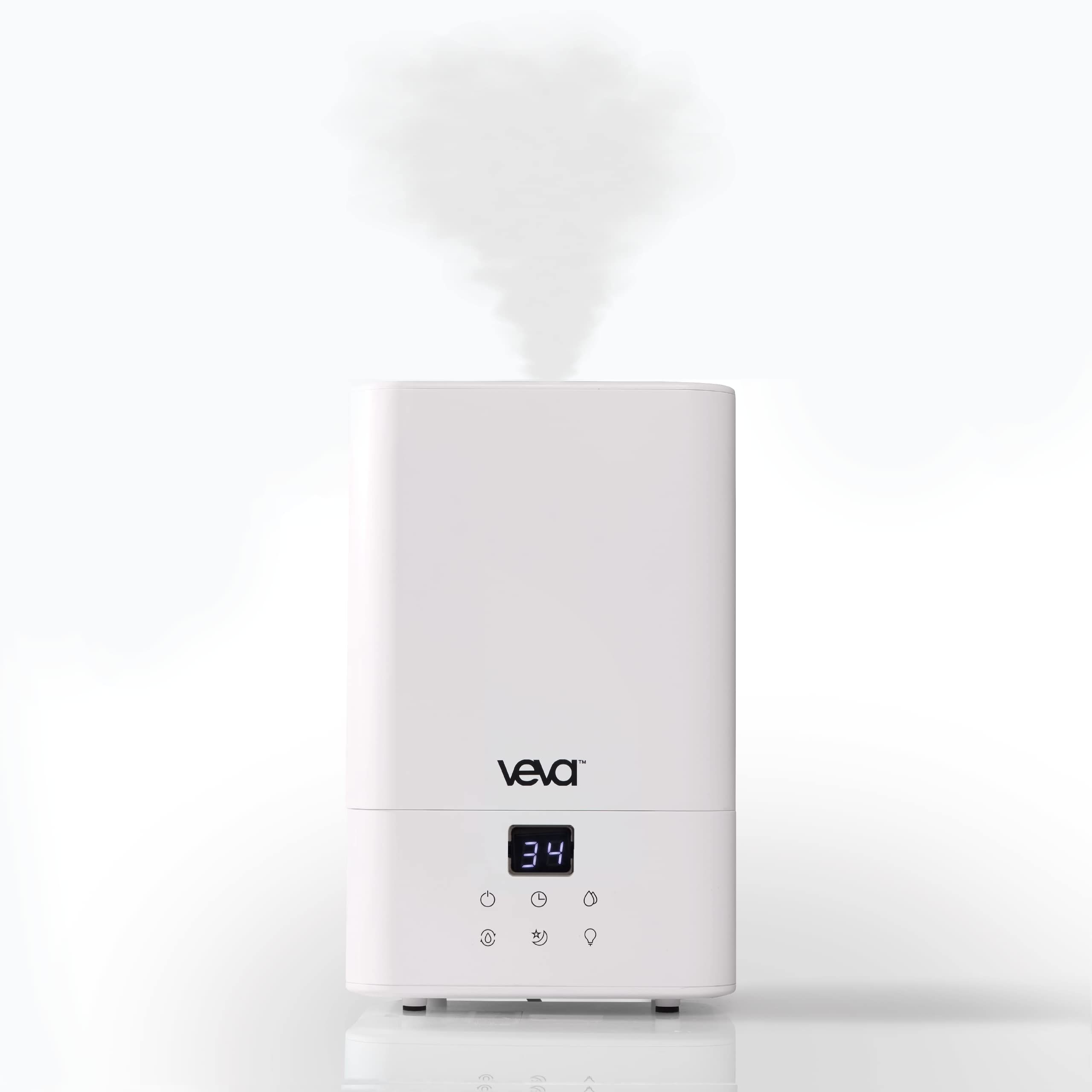 A sleek white humidifier emits steam from its top and displays a digital humidity reading of 34 on a front panel.