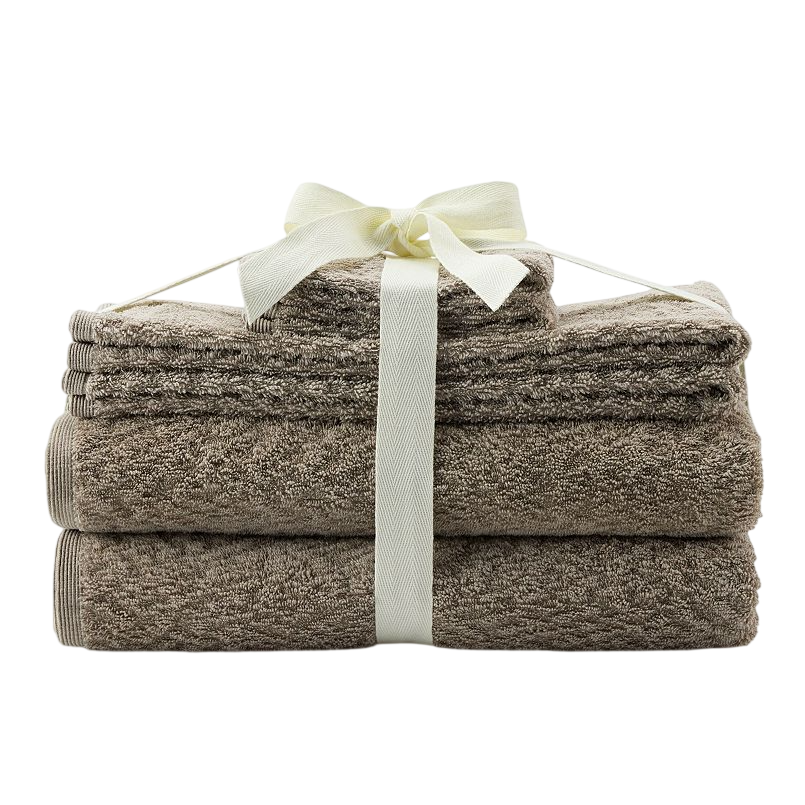 A set of brown towels tied with a cream-colored ribbon, includes several neatly stacked pieces.