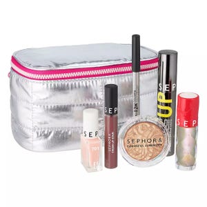 Sephora Makeup Gift Set includes a silver cosmetic bag, nail polish, cream lip stain, colorful luminizer, mascara, eye pencil, and lipstick.