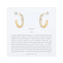 Gold and silver hoop earrings presented on a card with a heartfelt message dedicated to a mother, expressing gratitude and love.