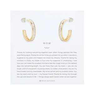 Gold and silver hoop earrings presented on a card with a heartfelt message dedicated to a mother, expressing gratitude and love.
