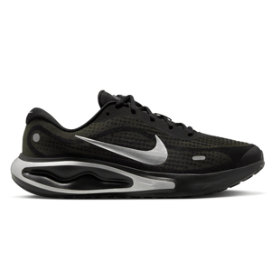 A black Nike running shoe with a silver swoosh logo and a uniquely designed midsole.