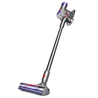 Cordless stick vacuum cleaner with a slim design and motorized brush head.