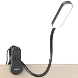 LED clip-on desk lamp with a flexible goose neck attached to a wooden surface.