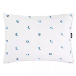 A rectangular white pillowcase featuring a repeating pattern of blue \“RL\“ logos, with a black side tag displaying the brand name.
