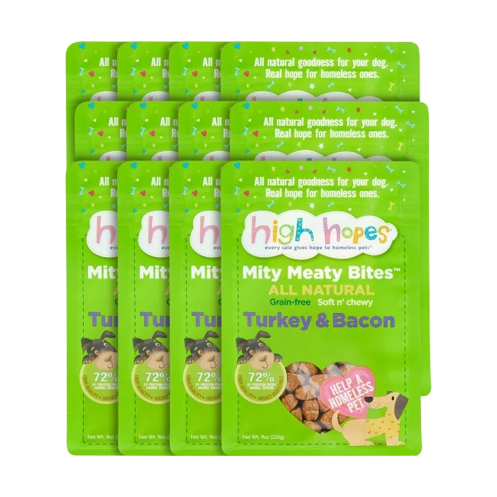 Nine packs of High Hopes Mity Meaty Bites dog treats in Turkey & Bacon flavor, grain-free and chewy, in green packaging.