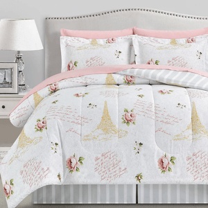 8-piece Paris & Floral Comforter Set features a design with Eiffel Tower motifs, pink roses, and cursive script on a white background. Includes a comforter, shams, sheets, and a bed skirt, accented with pink edges and stripes for a chic look.