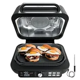 An open Ninja Grill & Griddle with eggs and sandwiches cooking on the griddle, accompanied by a temperature probe on the side.