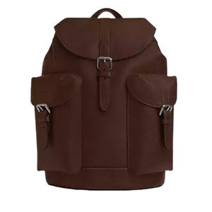 Dark brown leather backpack with flap closure, two front pockets, and silver buckle accents.