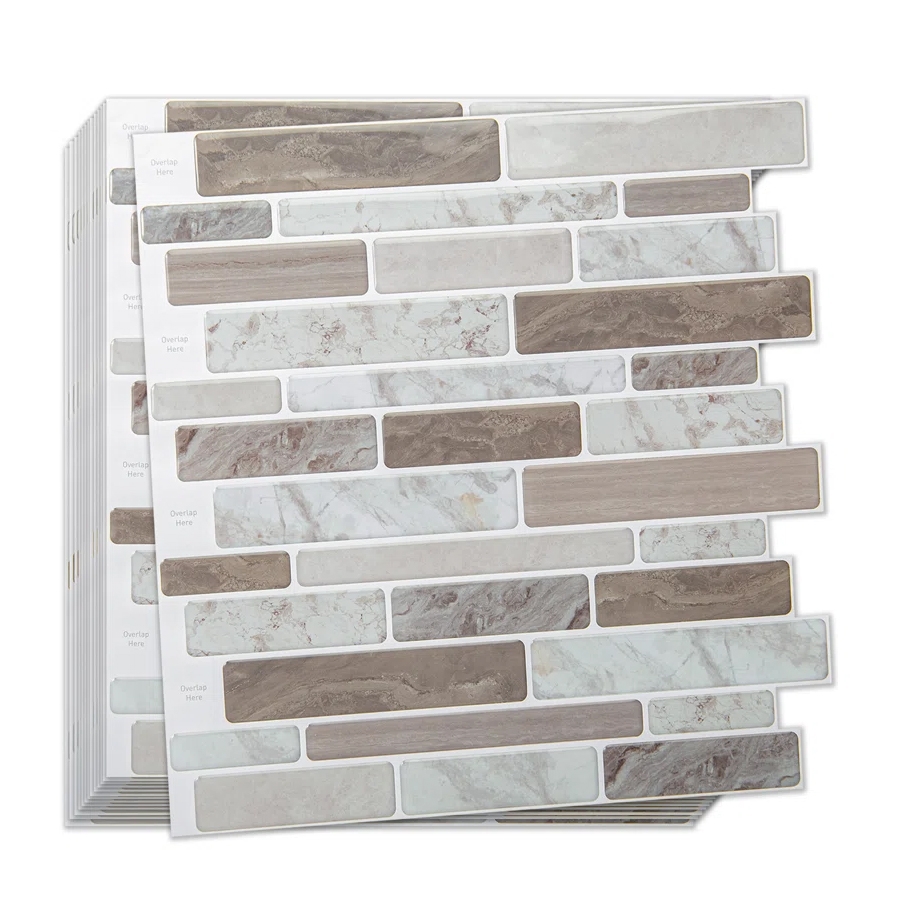 A set of peel-and-stick backsplash tiles featuring a mix of beige, brown, and white marble patterns in a brick-like arrangement.