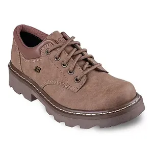 Brown lace-up Skechers with a chunky sole and contrast stitching details.