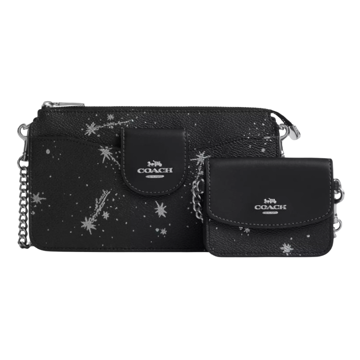 Black Coach wristlet and cardholder set with chain straps, featuring a silver star pattern and logo detailing on the front.