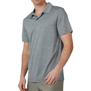 Man wearing a gray short-sleeve polo shirt paired with light gray pants.