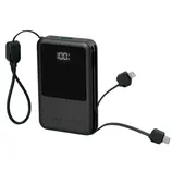 A black portable power bank with a digital display showing 100% charge, featuring built-in cables for charging devices with USB-C and Lightning connectors.