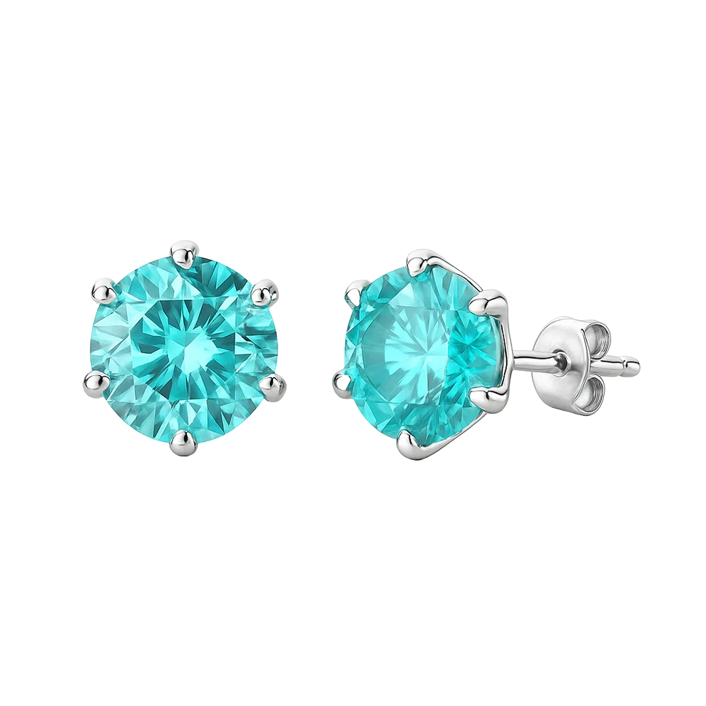 Silver stud earrings featuring round, turquoise blue gemstones secured by prongs.