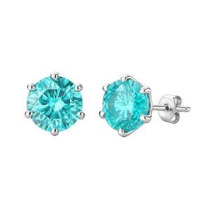 Silver stud earrings featuring round, turquoise blue gemstones secured by prongs.