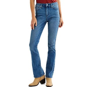Sonoma Bootcut Jeans feature a classic blue denim, mid-rise fit with a slight flare at the hem, and standard five-pocket styling. They are paired with brown ankle boots and a tucked-in red top.
