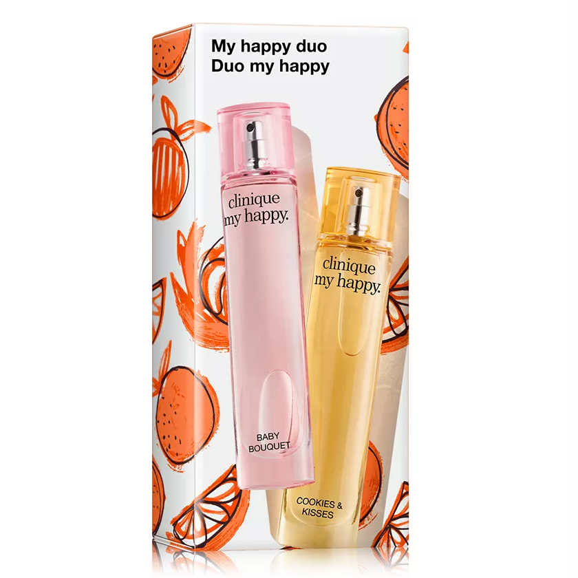 Clinique My Happy Duo includes two fragrances: Baby Bouquet and Cookies & Kisses, in a decorative box with orange illustrations.