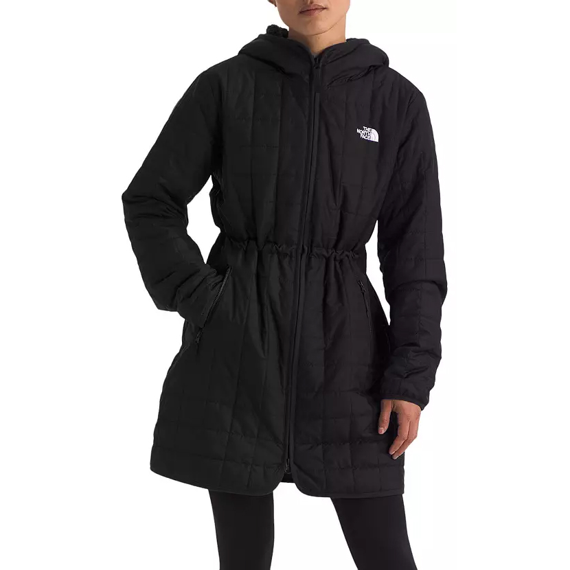 The North Face Junction Parka is a black, knee-length insulated coat with a hood and zip closure, featuring an adjustable waist and two front pockets. The North Face logo is displayed on the chest.