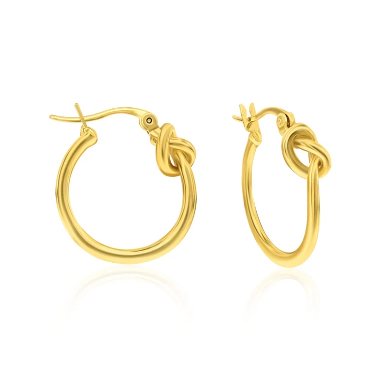 Gold hoop earrings with a knot design.