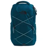 Teal backpack from The North Face, featuring elastic bungee cords on the front and a \“Jester\“ label at the bottom.