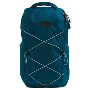Teal backpack from The North Face, featuring elastic bungee cords on the front and a \“Jester\“ label at the bottom.