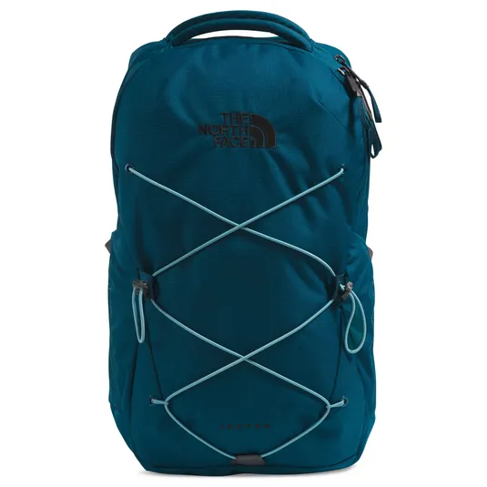 Teal backpack from The North Face, featuring elastic bungee cords on the front and a \“Jester\“ label at the bottom.