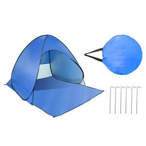 Blue pop-up beach tent with an extended floor panel, carrying bag, and six metal stakes for securing.