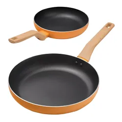 Two non-stick frying pans with orange exteriors and wooden handles are shown.