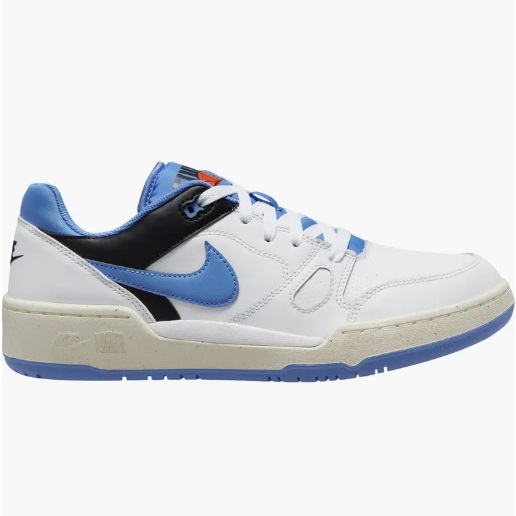 White and blue low-top sneaker with a swoosh logo on the side.