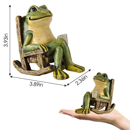 A solar-powered garden statue of a smiling frog sitting in a rocking chair, measuring 3.93 inches in height, 3.89 inches in width, and 2.36 inches in depth, is shown held in a hand for scale.