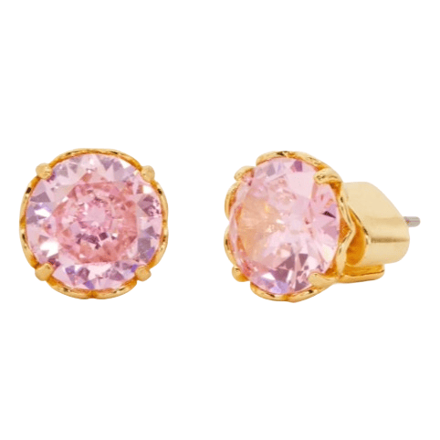 Gold-tone stud earrings with round pink gemstones in a prong setting.