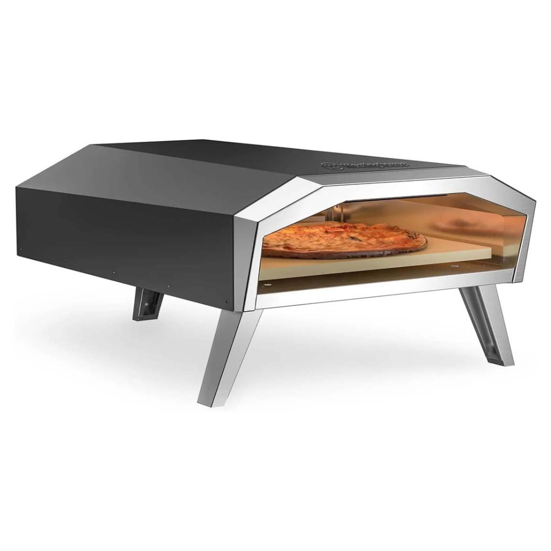The Westinghouse Artisan Pizza Oven is a compact, portable outdoor oven with a stainless steel design and stands on four legs. It features a wide opening for easy placement and removal of pizzas, and its modern look enhances outdoor cooking spaces.