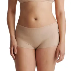 A person is wearing a beige bra and matching boyshort-style underwear, showcasing a seamless, smooth fabric.