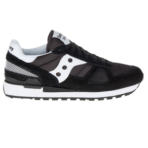 Black and white Saucony sneaker with mesh and suede details, featuring a distinctive wave pattern on the side.