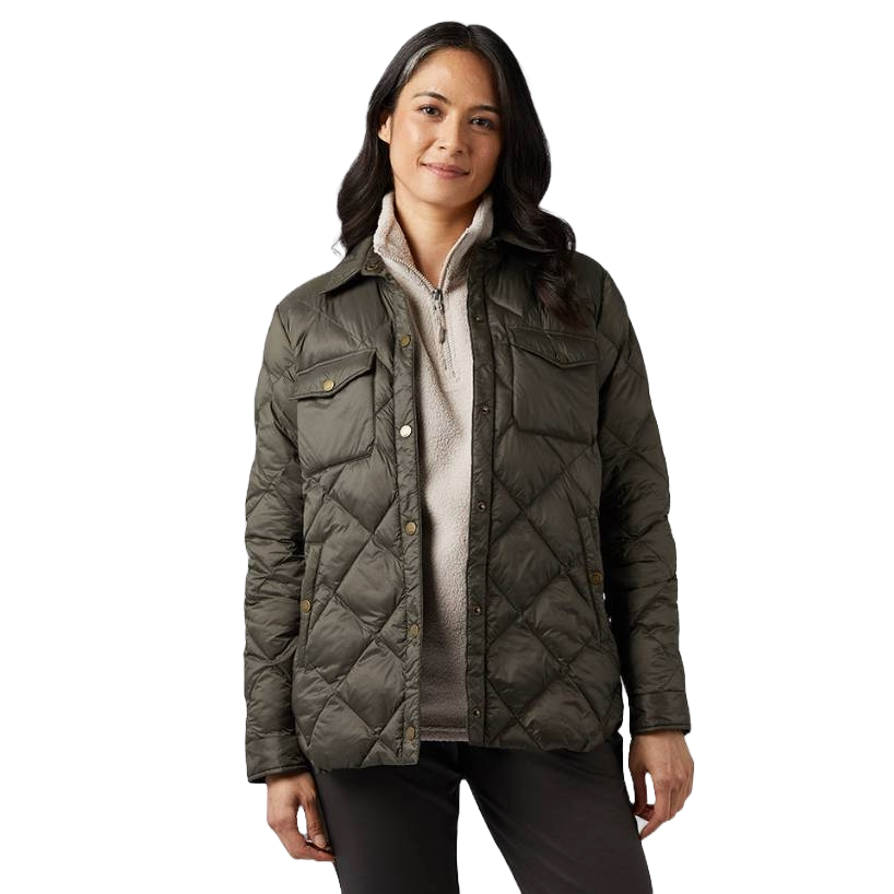 A woman wears a 32 Degrees Poly-Fil Shirt Jacket, featuring quilted diamond stitching, a dark green color, long sleeves, a front button closure, and two chest pockets over a light fleece zip-neck top.