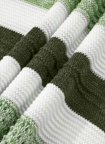 Striped knit fabric in shades of white, dark green, and light green with a textured pattern.