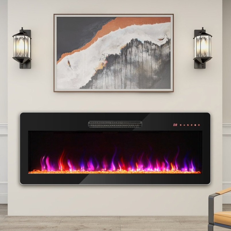 A modern electric fireplace with colorful LED flames is mounted on a wall, framed by two wall sconces. An abstract painting hangs above, and a chair with a cushion is nearby.