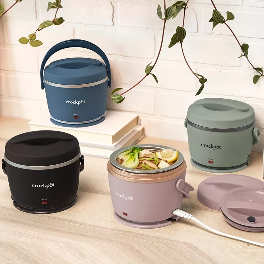 Four portable Crockpot food warmers, in a variety of colors, displayed on a countertop.