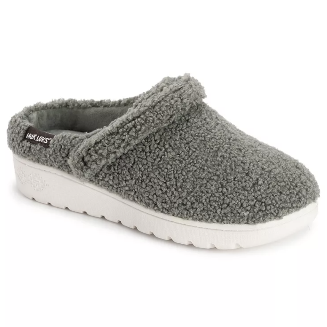 Gray fleece clog slipper with a white sole, featuring a cozy, textured design and a small tag with the brand name \“MUK LUKS\“.