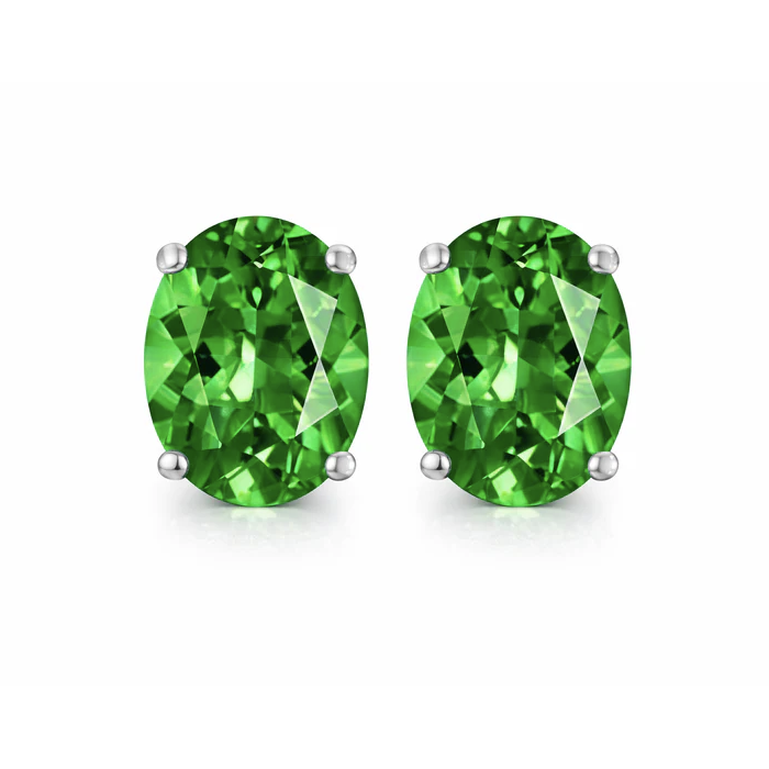 Oval-shaped green gemstone stud earrings set in silver prong settings.