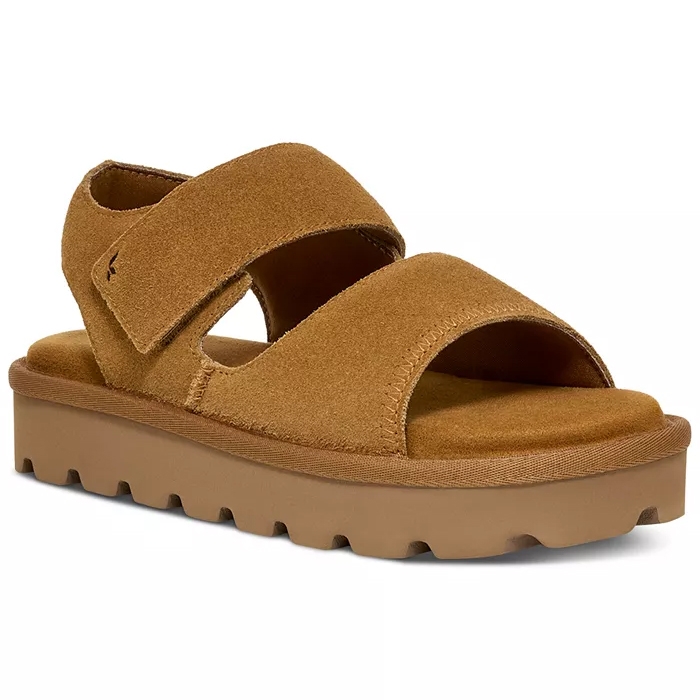 Brown sandal with two thick suede straps and a chunky, textured sole, featuring an adjustable closure.
