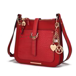 A red MKF embossed crossbody bag features a croc pattern and gold-tone hardware, charms, and buckle details. It has a front pocket and adjustable strap for convenience.