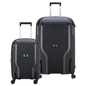 Two hard-shell suitcases with four wheels, featuring a sleek gray design and telescopic handles.